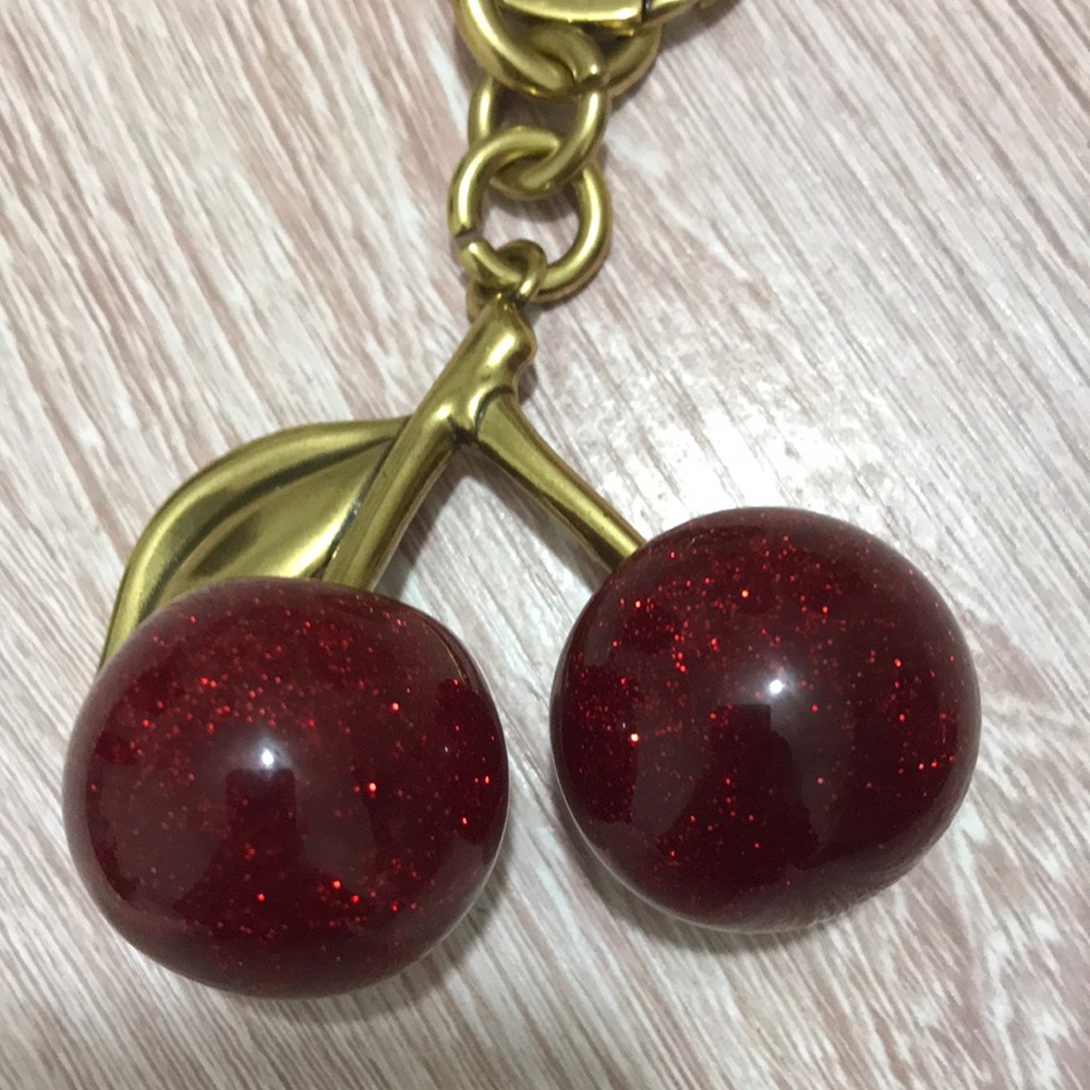 Coach Gold-Tone Cherry Keychain with Red Glitter Cherries - Picture 2 of 3